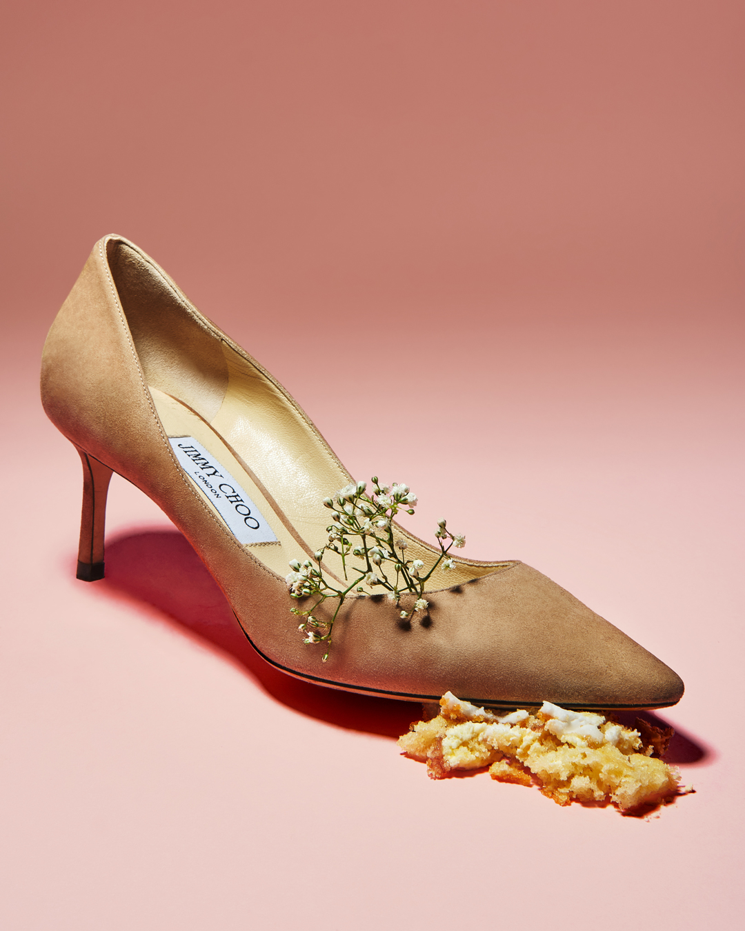 jimmy choo nude suede kitten heel stepping on vanilla wedding cake